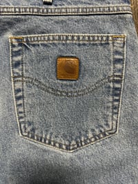 Image 4 of Carhartt Vintage 90s light wash denim jeans, 100% cotton, leather patch