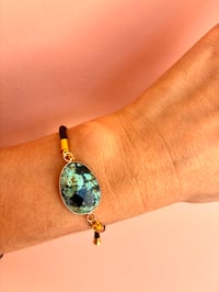 Image 1 of BRACELET TURQUOISE D’AFRIQUE SUR CORDON