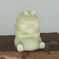 Image 1 of Gus- white to black photochromatic (aqua glow)
