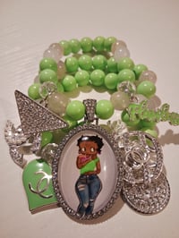 Image 1 of Betty in green with jeans