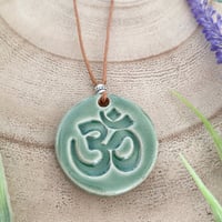 Image 1 of Handmade Ceramic Green OM Pendant Necklace 