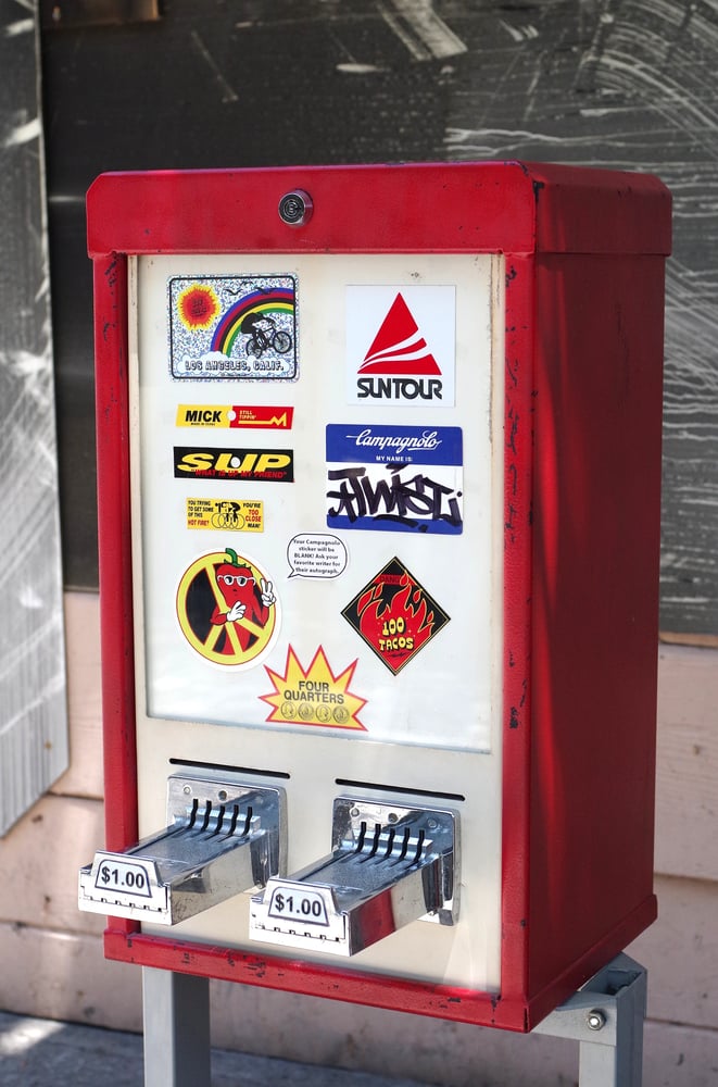 Image of **The 100 Tacos Sticker Machine** (ONE OF EVERYTHING IN IT)