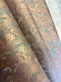 Image 2 of Copper combed hand marbled on brown paper // 5 sheets available 