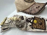 Image 1 of The Girl Wears Coach