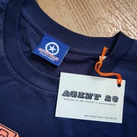 Image 7 of AGENT 23 - SYNCHRONICITY ENGINEER T-SHIRT with book, badge, and card