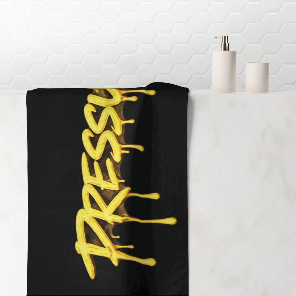 Image of Pressure Graphic Towel — Black Beach & Gym Towel with Dripping Gold Text