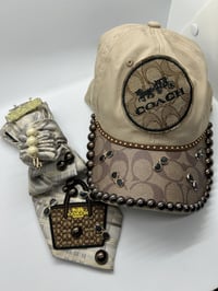 Image 2 of The Girl Wears Coach