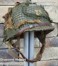 Image 1 of WWII M2 101st Airborne 506th Helmet D-bale Front Seam Westinghouse Paratrooper. Captain. Net & Scrim