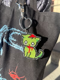 Image 1 of Denim-backed Zombie Cat Keychain