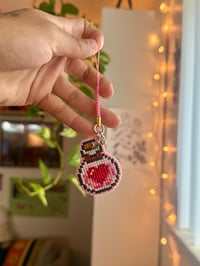 Image 1 of Felt-backed love/healing potion keychain