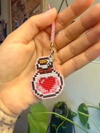 Image 2 of Felt-backed love/healing potion keychain