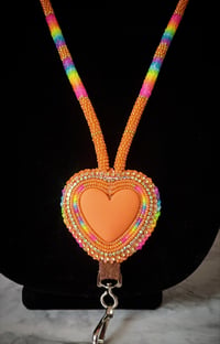 Image 2 of Orange neon heart lanyard 