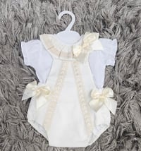 Cream double bow rompee