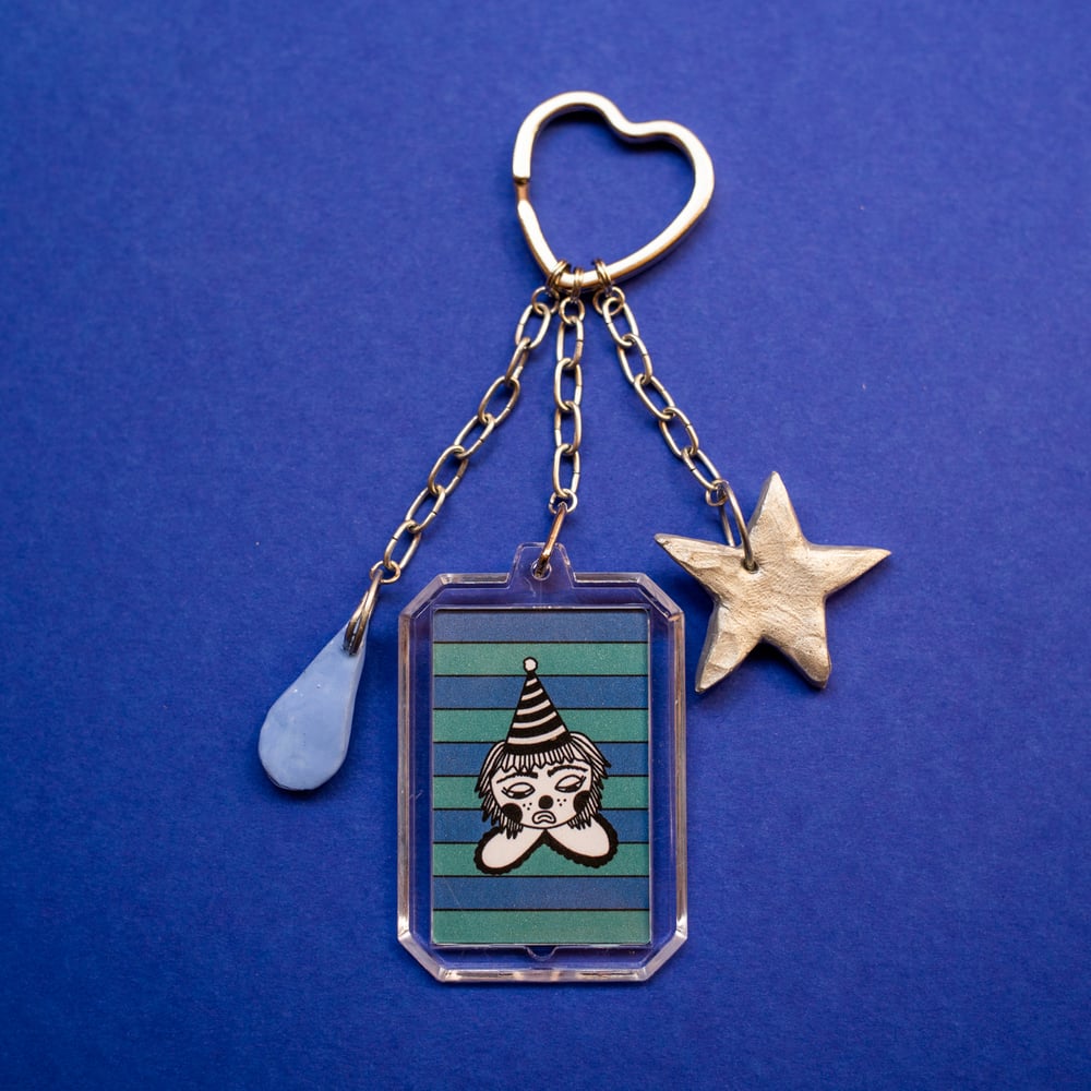Image of sad clown key chain
