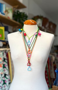 Image 2 of Portaamores y/o collar regulable  de Domingo Ayala 