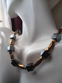 Image 8 of HEMATITE CUBES WITH GOLD TONE FACETED TUBES AND SQUARES
