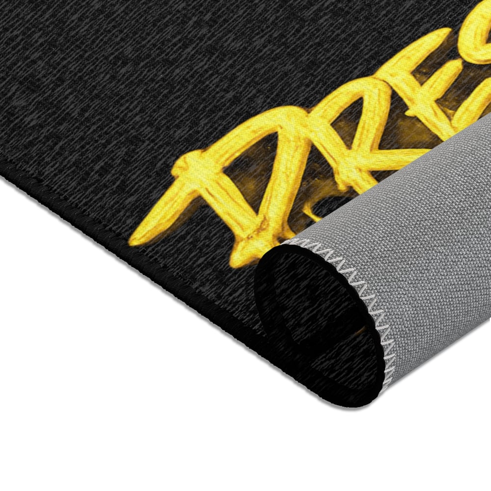 Image of Pressure Graffiti Area Rug — Black & Yellow Drip Street Art Accent Rug