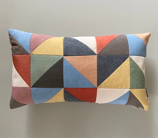 Image of Triangles, patchwork cushion with plant-dyed panels