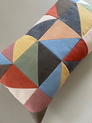 Image of Triangles, patchwork cushion with plant-dyed panels