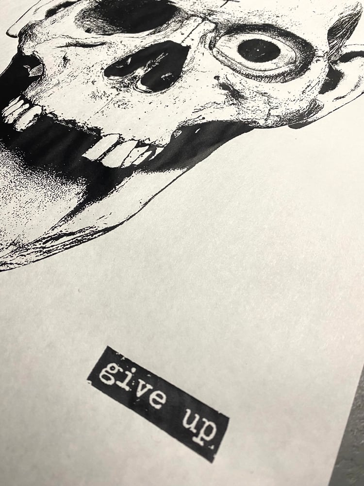 Image of 'laughing skull' print