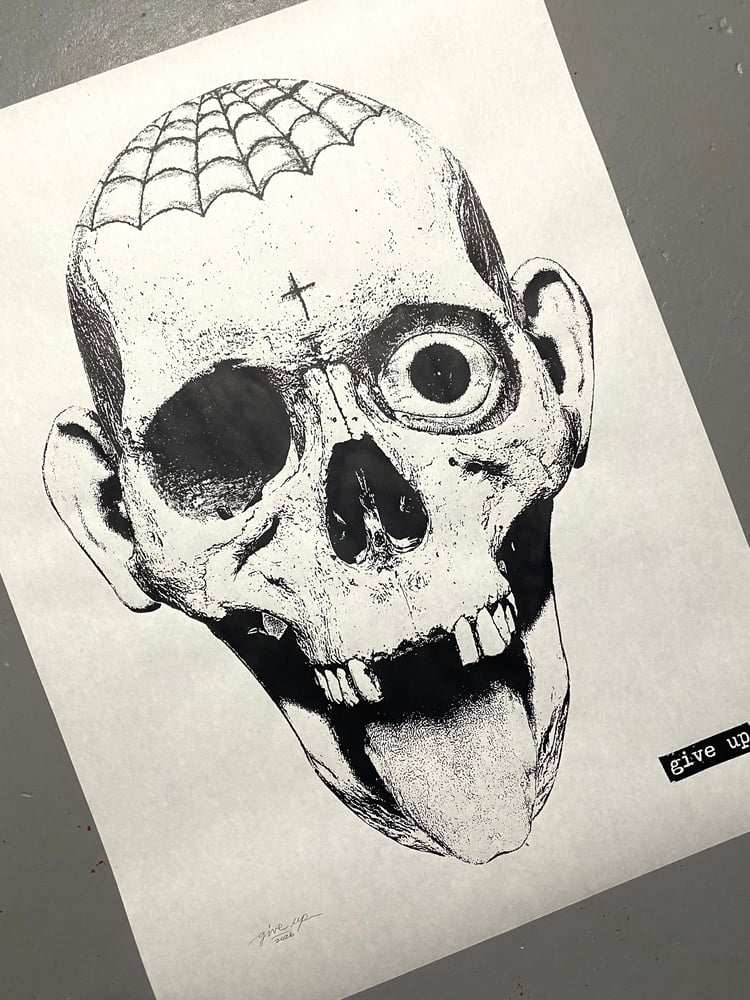 Image of 'laughing skull' print