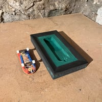 Image 1 of 31. Ledge - Roman Pool - black and green