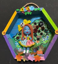 Image 2 of Halloween character in field of wild flowers & roses