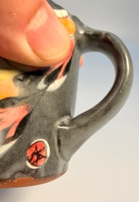 Image 1 of Black and Pink Mug
