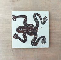 Brownish frog tile