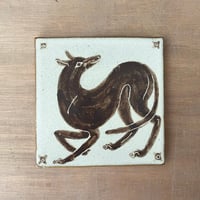 Brown longdog tile