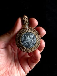 Image 1 of RARE VINTAGE round ornate perfume bottle with preseved web A
