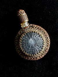 Image 2 of RARE VINTAGE round ornate perfume bottle with preseved web A