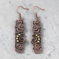 Aged metal earrings 