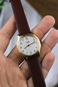 Image 1 of 1990s Oris Triple Date 7429 - Manual Winding Movement