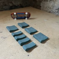 Image 1 of 73 - Pool Coping Blocks - assorted dark green blocks