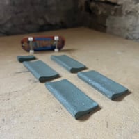 Image 1 of 75 - Pool Coping Blocks - assorted dark green blocks