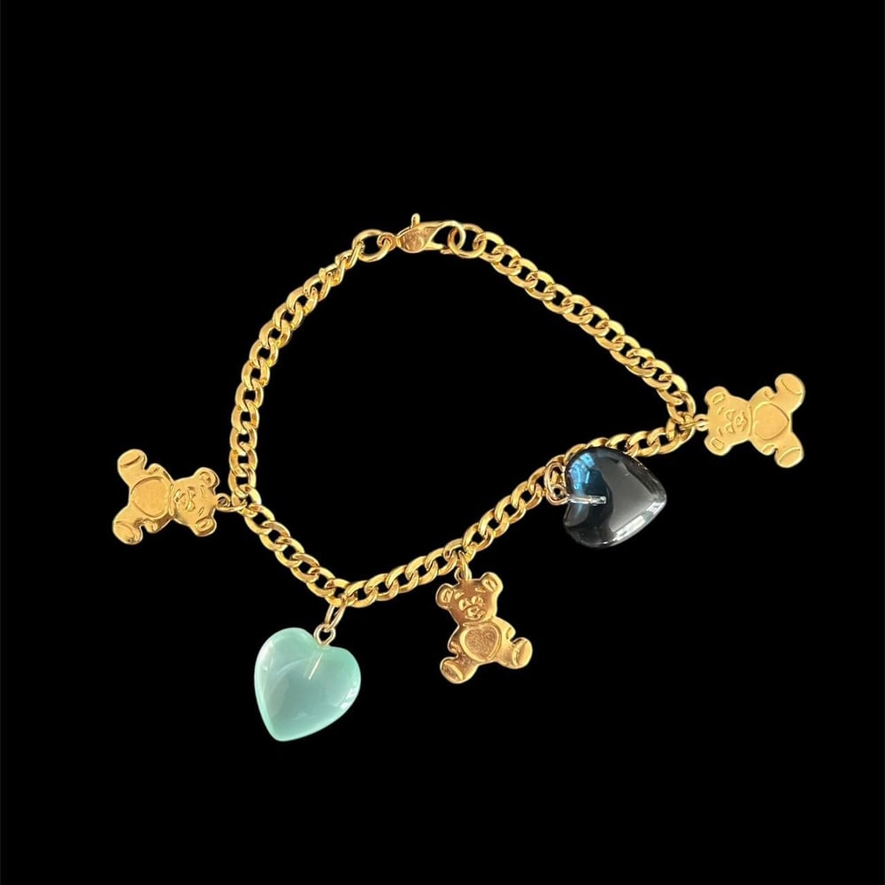 Image of Gold Tone Teddy Bear Charm Bracelet with Hearts (7")