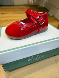red plain patent shoes