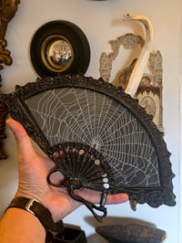 Image 2 of Vintage bkack ornate fan shaped frame with preserved web
