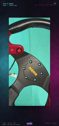 Image 3 of MOMO Three-Spoke Steering Wheel — Red Anodised / Black Leather