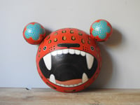 Image 3 of red ROAR bear wall hanging