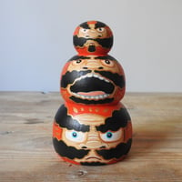 Image 1 of three daruma stack