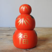 Image 3 of three daruma stack