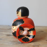 Image 2 of wheeled daruma girl