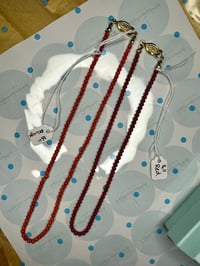 Image 1 of 14” red smooth bead coral necklace 