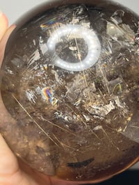 Image 17 of Golden Rutile In Smoky Quartz Sphere #1770