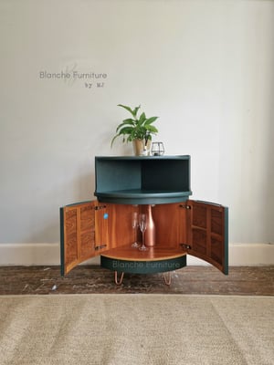 Image of Nathan Corner Drinks Cabinet in Bottle Green with Copper legs