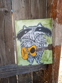Image 1 of Raccoon Playing Guitar 