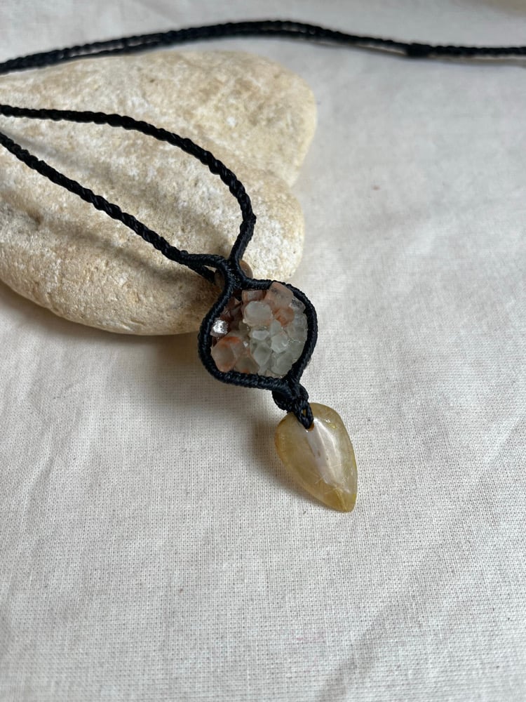 Image of Macrame pendant with aragonite and rutilated quartz