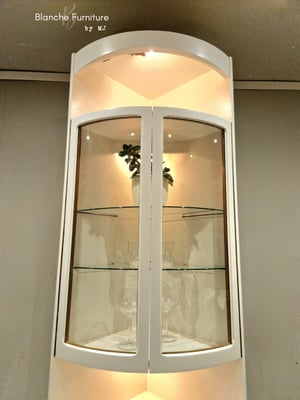 Image of Nathan Corner Drinks Cabinet unit in Stone with light. 